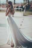 Una línea de vestidos de novia de tul con apliques, vestidos de novia